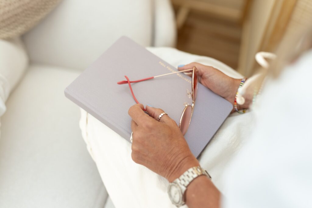 Southeast Aesthetic + Wellness customer taking notes during consult
